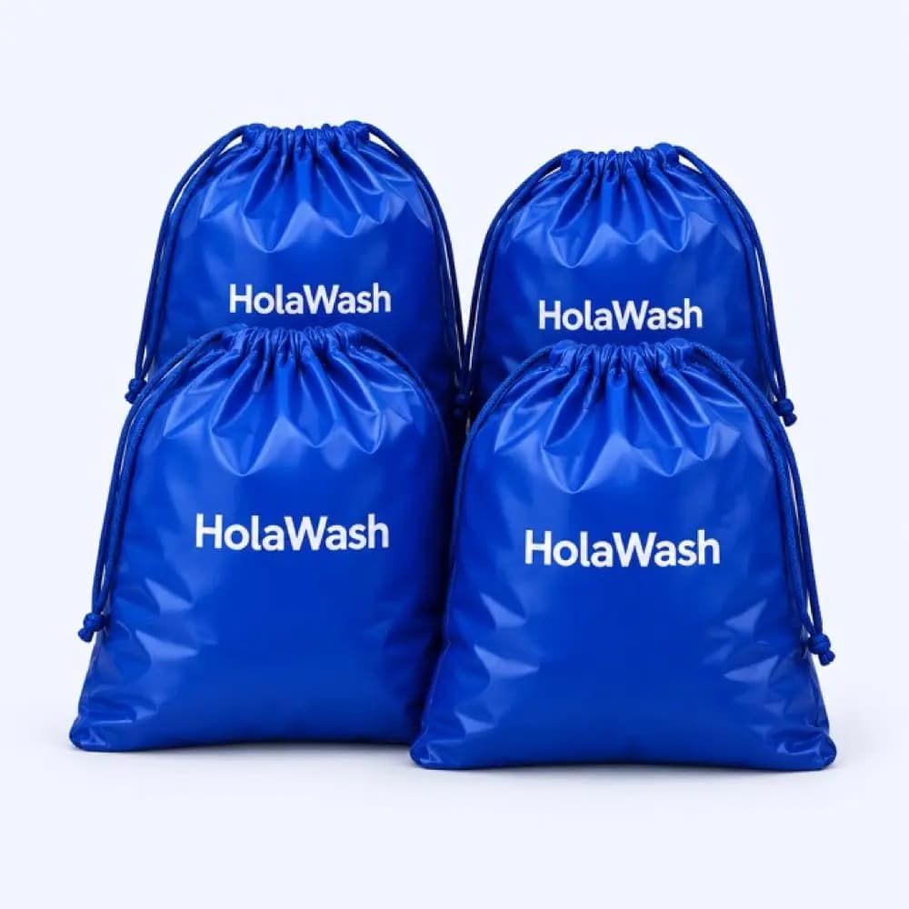 Four HolaWash laundry bags, the month's allowance on the Plus plan